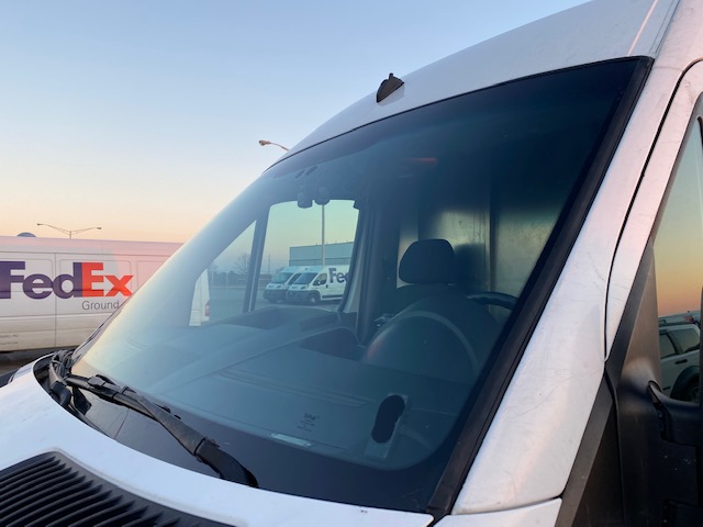 Company vehicle being pressure washed
