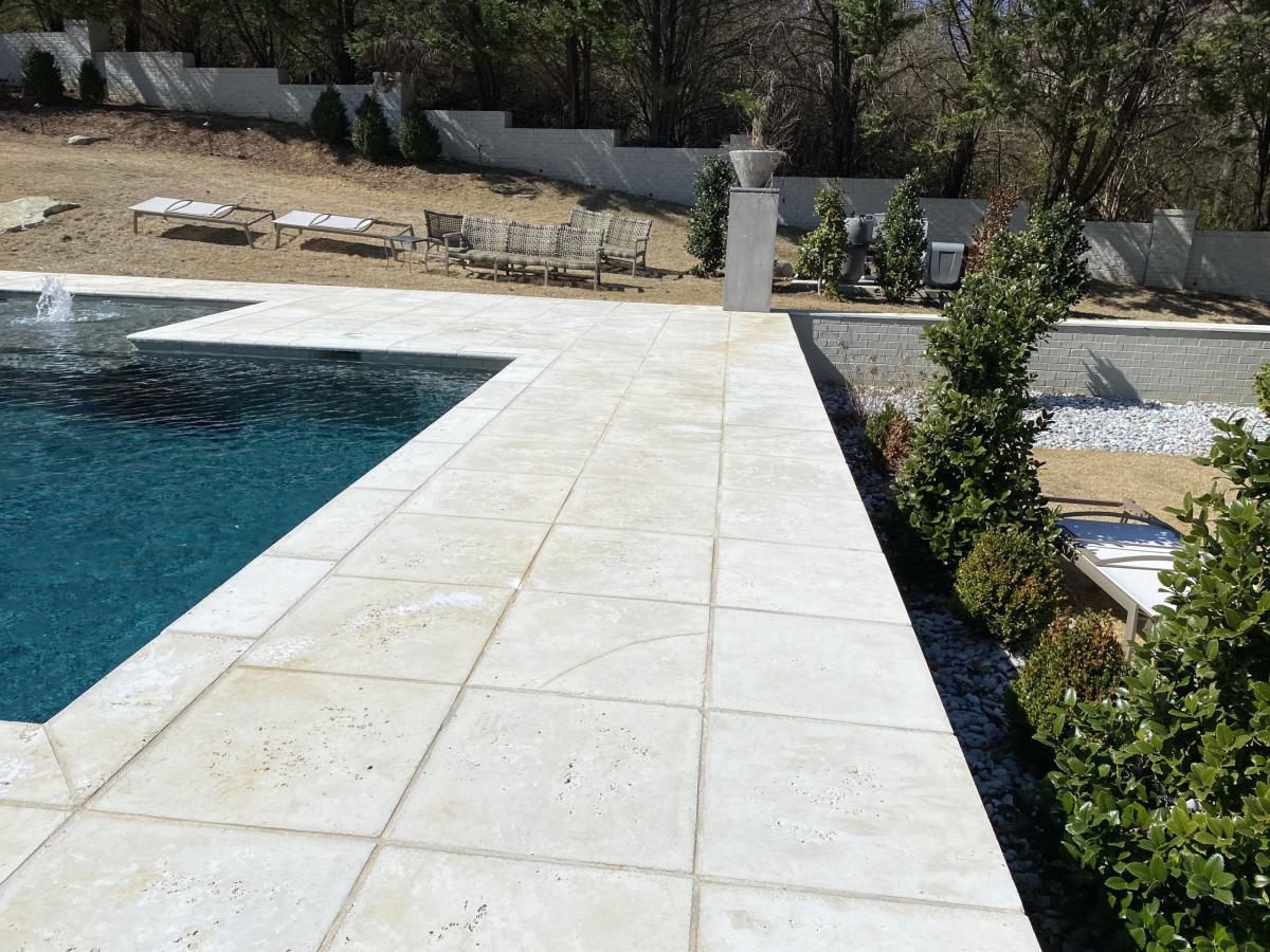 Clean pool deck after pressure washing